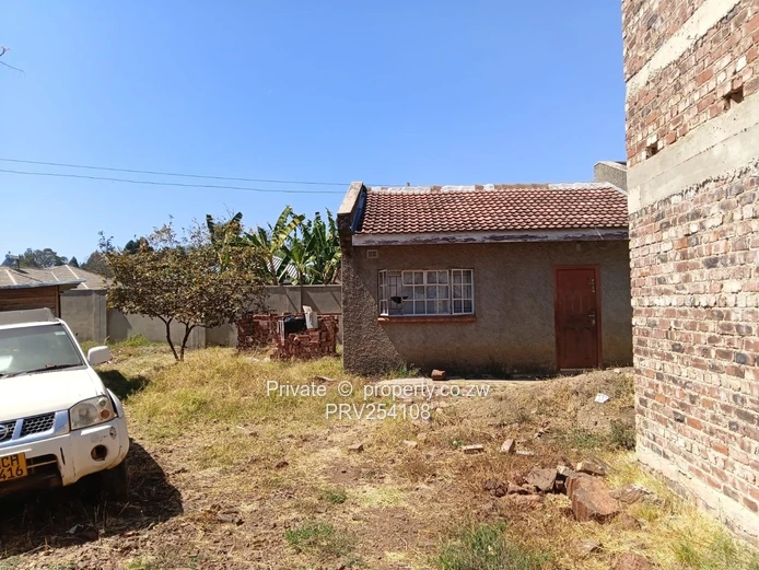 5-Bed Home with Brick Wall & Metal Gate in Pomona