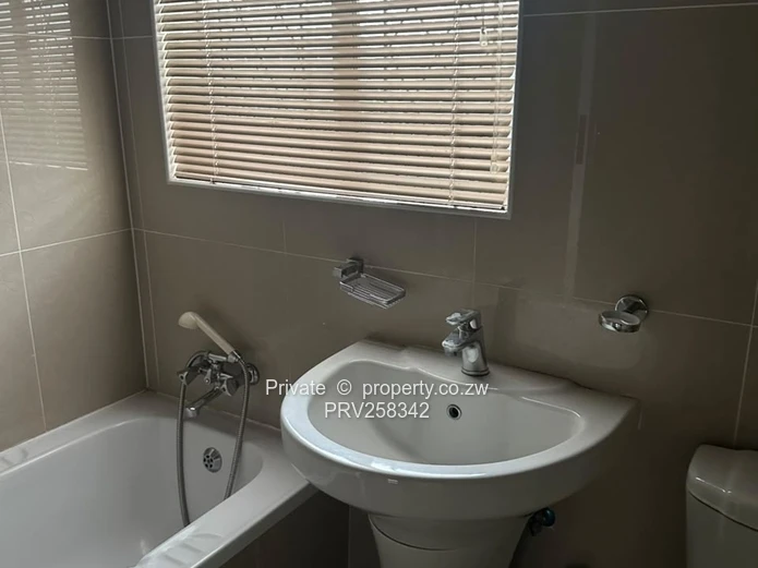 Kensington 2-Bed Flat 40m2 — Borehole & Secure Garden