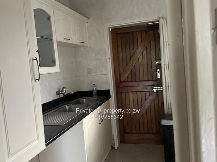 Kensington 2-Bed Flat 40m2 — Borehole & Secure Garden