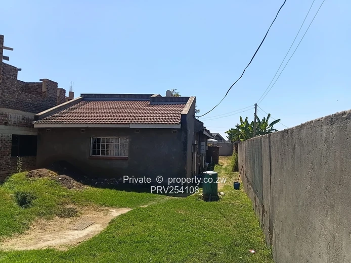 5-Bed Home with Brick Wall & Metal Gate in Pomona