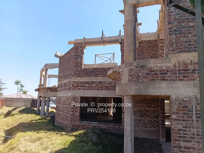 5-Bed Home with Brick Wall & Metal Gate in Pomona