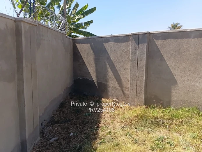 5-Bed Home with Brick Wall & Metal Gate in Pomona