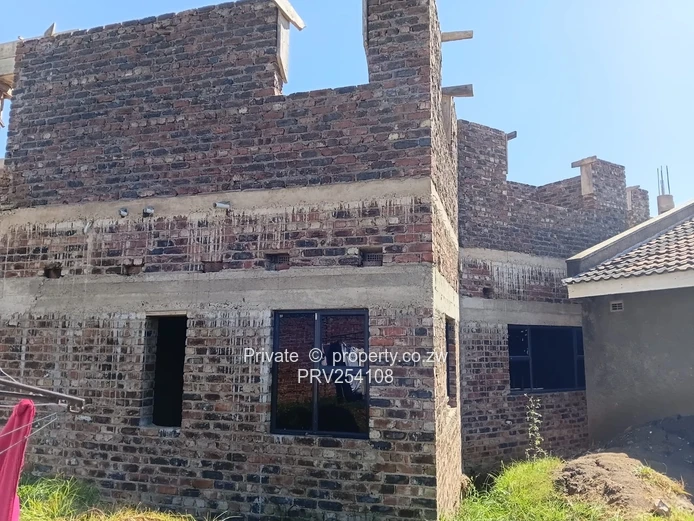 5-Bed Home with Brick Wall & Metal Gate in Pomona