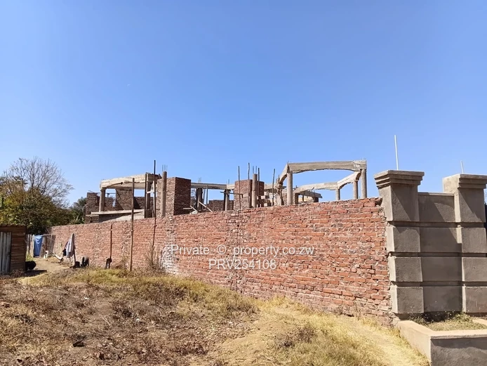 5-Bed Home with Brick Wall & Metal Gate in Pomona