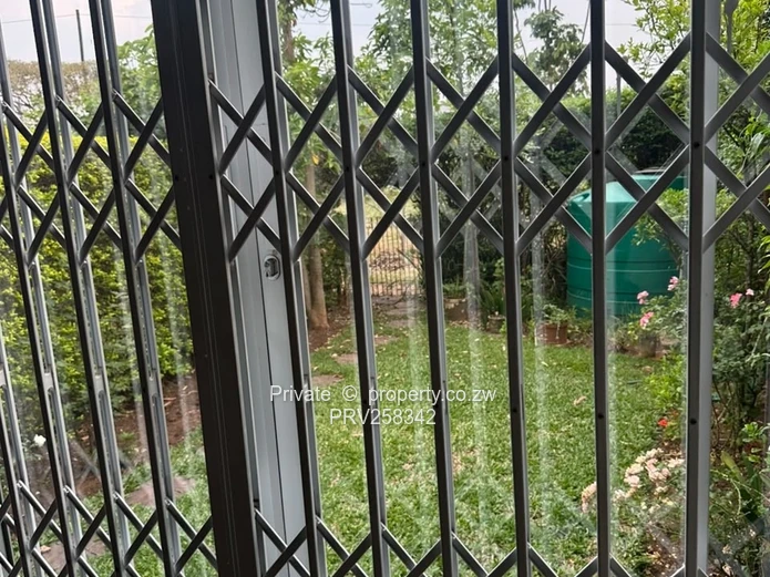 Kensington 2-Bed Flat 40m2 — Borehole & Secure Garden