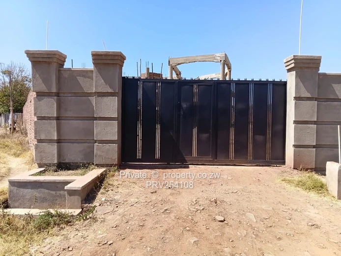 5-Bed Home with Brick Wall & Metal Gate in Pomona